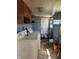 Laundry area featuring a washer, dryer, shelving, and storage at 1901 S F St, Elwood, IN 46036
