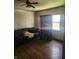 Living room featuring hardwood floors, a sofa, and natural lighting from a window at 1901 S F St, Elwood, IN 46036