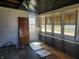 View of porch with many windows at 1901 S F St, Elwood, IN 46036