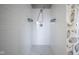Modern bathroom featuring a walk-in shower with sleek white subway tile and updated fixtures at 1921 Union St, Indianapolis, IN 46225
