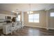 Eat in kitchen with stainless appliances, granite counters, island and hard surface floors at 1921 Union St, Indianapolis, IN 46225