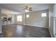 Spacious living room featuring hard surface floors and a ceiling fan at 1921 Union St, Indianapolis, IN 46225