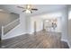 An open living area featuring new vinyl floors and open access to the kitchen at 1921 Union St, Indianapolis, IN 46225