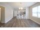 Open living area with eat in kitchen, featuring hard surface floors and recessed lighting at 1921 Union St, Indianapolis, IN 46225
