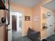 Finished basement area featuring modern finishes, painted walls, and a doorway to a bathroom and stairwell at 1995 Brookfield Ct, Columbus, IN 47201