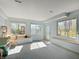 Bright, open basement with large windows and a sitting area perfect for relaxing at 1995 Brookfield Ct, Columbus, IN 47201