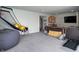 Open basement featuring a cozy seating area with a wet bar and entertainment options at 1995 Brookfield Ct, Columbus, IN 47201