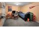 Finished basement bedroom area with playful decor, carpeted floor, and modern furniture at 1995 Brookfield Ct, Columbus, IN 47201