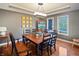 Elegant dining room featuring tray ceilings, natural light and stylish decor at 1995 Brookfield Ct, Columbus, IN 47201