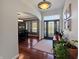 Warm foyer offers seamless transition into the dining room through elegant archway at 1995 Brookfield Ct, Columbus, IN 47201
