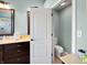 This convenient half bath is located just off the primary bath for added privacy at 1995 Brookfield Ct, Columbus, IN 47201