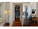 A kitchen has stainless appliances, granite counters, hardwood flooring, pantry, and desk area at 1995 Brookfield Ct, Columbus, IN 47201