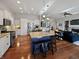 Open kitchen featuring granite countertops, stainless steel appliances, and a breakfast bar with seating at 1995 Brookfield Ct, Columbus, IN 47201