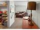 Finished basement living area with contemporary lighting, brown sofa set, and wall decor at 1995 Brookfield Ct, Columbus, IN 47201