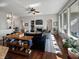 Open living room with a fireplace, built-in shelving, and large windows offering lots of natural light at 1995 Brookfield Ct, Columbus, IN 47201