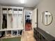 A mud room has built-in storage, seating, and access to other living areas at 1995 Brookfield Ct, Columbus, IN 47201