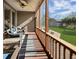 Cozy screened porch with comfortable seating overlooking the landscaped backyard and a storage shed at 1995 Brookfield Ct, Columbus, IN 47201