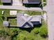 An aerial view showcasing the home's layout, including the backyard, shed, and proximity to neighboring properties at 212 W Burnside Ave, Fairland, IN 46126