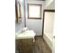 Bathroom featuring tile floors, sink, toilet and tub with shower at 212 W Burnside Ave, Fairland, IN 46126
