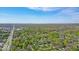 A high-angle shot of the property in the city, highlighting greenery and clear skies at 2204 Pamela Dr, Indianapolis, IN 46220