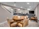 Finished basement with a cozy seating area and adjacent exercise space at 2204 Pamela Dr, Indianapolis, IN 46220