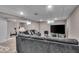 Spacious finished basement with a lounge area and a TV at 2204 Pamela Dr, Indianapolis, IN 46220