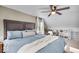 Inviting bedroom featuring a cozy bed, plush bedding, and ample natural light at 2204 Pamela Dr, Indianapolis, IN 46220