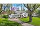Charming home with a well-manicured lawn, attached garage, and inviting curb appeal at 2204 Pamela Dr, Indianapolis, IN 46220
