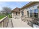 Spacious back deck with outdoor seating area, perfect for entertaining or enjoying the views of the backyard at 2446 Quiet Way, Indianapolis, IN 46239