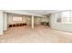 Finished basement featuring a projection screen, entertainment center and game table at 2446 Quiet Way, Indianapolis, IN 46239