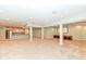 Finished basement with a wet bar, entertainment area, and open layout at 2446 Quiet Way, Indianapolis, IN 46239