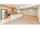 Finished basement featuring a wet bar, cabinets and carpet at 2446 Quiet Way, Indianapolis, IN 46239