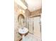 This bathroom features a pedestal sink and a glass enclosed shower at 2446 Quiet Way, Indianapolis, IN 46239