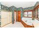 Bathroom with a jacuzzi tub, tiled floors, and a shower at 2446 Quiet Way, Indianapolis, IN 46239