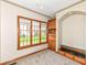 Bright bedroom featuring a large window and built-in cabinets at 2446 Quiet Way, Indianapolis, IN 46239