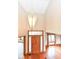 Grand foyer with a chandelier and wooden floors at 2446 Quiet Way, Indianapolis, IN 46239