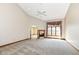 Cozy living room features a fireplace and plush carpeting at 2446 Quiet Way, Indianapolis, IN 46239