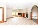 Cozy living room with tiled floors, a fireplace, and a built-in media center at 2446 Quiet Way, Indianapolis, IN 46239