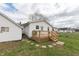 Exterior photo of a wooden backyard deck, attached to the home and garage at 282 N Mapleton St, Columbus, IN 47201