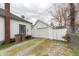 Exterior photo of the home's detached garage with a driveway, and the home's rear is visible at 282 N Mapleton St, Columbus, IN 47201