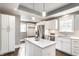 Open kitchen featuring a granite island, stainless steel appliances, and lots of counter and cabinet space at 3031 Nowland Ave, Indianapolis, IN 46201