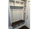 Hallway with hooks, bench, and cubbies to hang coats and store shoes when you come inside at 3031 Nowland Ave, Indianapolis, IN 46201