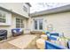 Cozy backyard deck with wicker seating, a patterned rug, and natural wood grain at 3051 Firestone Cir, Indianapolis, IN 46234