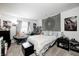 Bright bedroom with a cozy chair, desk, and decorative tapestry, perfect for relaxing and studying at 3051 Firestone Cir, Indianapolis, IN 46234