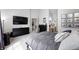 Spacious main bedroom boasts neutral walls and carpet, along with comfortable, stylish decor at 3051 Firestone Cir, Indianapolis, IN 46234