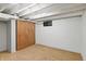 Finished basement with carpet and ample space, perfect for storage or activities at 3255 W 30Th St, Indianapolis, IN 46222