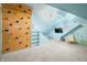 Fun attic featuring a rock climbing wall, soft carpet, and muraled walls at 3331 Daniel St, Mooresville, IN 46158