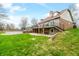 Expansive backyard featuring a two-story deck and pool, perfect for entertaining at 3331 Daniel St, Mooresville, IN 46158