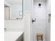Modern bathroom showcasing sleek marble tiles, a stylish black showerhead, and a chic vanity area at 3331 Daniel St, Mooresville, IN 46158
