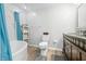 Cozy, well-lit bathroom featuring a soaking tub, marble details, and a modern toilet at 3331 Daniel St, Mooresville, IN 46158